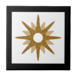 Modern Single Gold Starburst Black Frame Ceramic T Tile<br><div class="desc">Modern design featuring a single gold starburst on a light background, framed in black. Simple, clean modern design. Create your own custom tile by uploading a new image, or use the "message" button to contact the designer for help. To create your own design: 1. Select personalise this template. 2. Replace...</div>