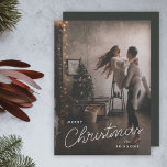 Modern Trendy Christmas | Dark Dusky Couple Photo Holiday Card<br><div class="desc">A trendy stylish holiday photo flat greeting card with modern and handwritten script typography in white over a full photo with black faded tint and a deep smoky green grey colour on the reverse. The photo and name can be easily customised for a personal touch. A simple, minimalist and contemporary...</div>