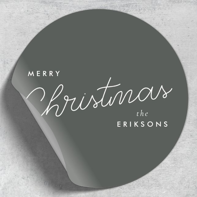 Modern Trendy Christmas | Forest Green Dark Dusky Classic Round Sticker (Modern script stickers by Guava, featuring white typography on smoky green-gray background)