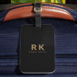 Modern Trendy Minimalist Black Gold Two Monogram Luggage Tag<br><div class="desc">A modern and elegant two monogram luggage tag in black and gold. Featuring a casual minimalist bold serif font of initials and name for personalisation. Truly giving a classic and crisp yet trendy and casual feel. Perfect as an accessory or gift to your friends,  colleagues,  or workmates.</div>