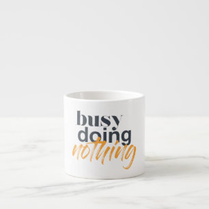 Modern, trendy, urban design of Busy Doing Nothing Espresso Cup