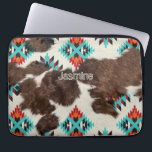 Modern Vintage SouthWestern Cowhide Aztec Pattern Laptop Sleeve<br><div class="desc">This unique laptop sleeve seamlessly blends Southwestern style with rustic Western aesthetics, creating a distinctive accessory that stands out in both vintage and contemporary settings. The sleeve features a genuine cowhide exterior that adds an authentic rustic touch, while the Aztec pattern in turquoise hues captures the essence of Southwestern design....</div>