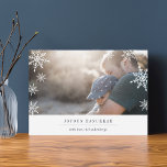 Modern Wish Hanukkah Photo Card | Editable Message<br><div class="desc">Modern, simple and minimal holiday photo card features your favourite horizontal or landscape orientated photo with a thick white bottom border. Your custom greeting appears in modern midnight blue lettering (shown with "Joyous Hanukkah"), with your family name or names beneath. A subtle snowflake pattern is overlaid over the edges of...</div>