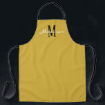 Modern Yellow Gold Script Monogram Personalised Apron<br><div class="desc">Show your style with this Modern Yellow Gold Script Monogram Personalised Apron. It is designed with a gold all-over-print background and initial is in black and name is in white calligraphy script lettering. Makes a great gift idea for women who love to bake and cook. Click personalise template option and...</div>