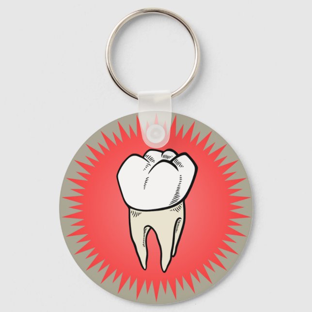 Molar freshly extracted on a red starburst key ring (Front)