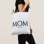 Mom Established New Mom Gift Tote Bag<br><div class="desc">Modern, minimalist MOM ESTABLISHED tote bag with CUSTOMIZABLE text. Minimal elegant classic black serif font tote bag. Can be personalized by changing MOM to MUM, MAMA or even MIMI, and the simple sans serif EST 2025 can be changed to edit the year (and add subsequent years for additional children, if...</div>