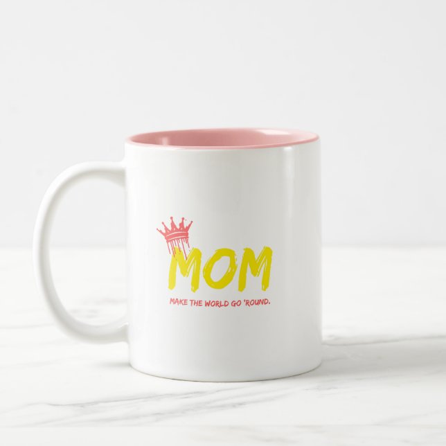 Moms make the world go 'round. Two-Tone coffee mug (Left)