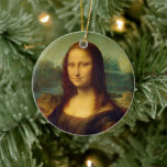 Mona Lisa | Leonardo da Vinci Ceramic Ornament<br><div class="desc">Mona Lisa (1503-1506) by Italian Renaissance artist Leonardo da Vinci. The original work is oil on poplar wood panel. This famous painting is thought to be a portrait of Lisa Gherardini, and has been acclaimed as "the best known, the most visited, the most written about, the most sung about, the...</div>