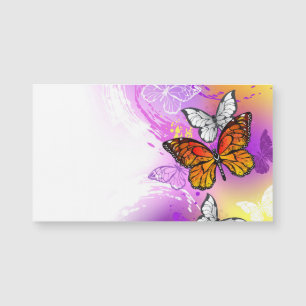 Monarch Butterflies on Purple Background