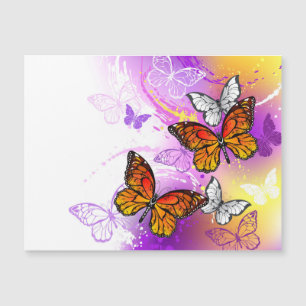 Monarch Butterflies on Purple Background