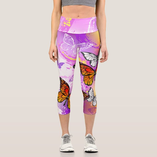 Monarch Butterflies on Purple Background Capri Leggings (Front)