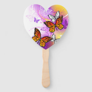Monarch Butterflies on Purple Background Hand Fan