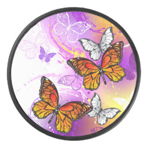 Monarch Butterflies on Purple Background Hockey Puck