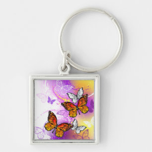 Monarch Butterflies on Purple Background Key Ring