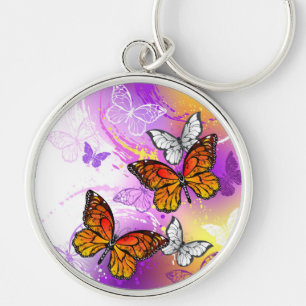 Monarch Butterflies on Purple Background Key Ring