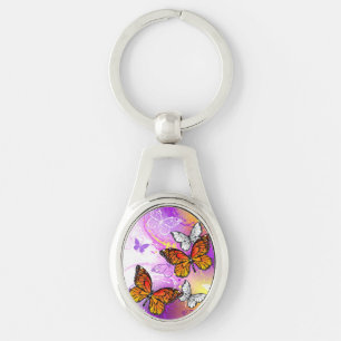 Monarch Butterflies on Purple Background Key Ring