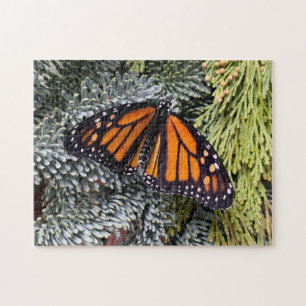 Monarch butterfly on evergreens jigsaw puzzle