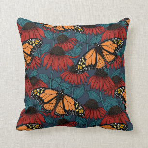 Monarch butterfly on red coneflowers cushion