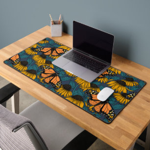 Monarch butterfly on yellow coneflowers desk mat