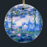 Monet Pink Water Lilies  Ceramic Ornament<br><div class="desc">A Monet pink water lilies ornament featuring beautiful pink water lilies floating in a calm blue pond with lily pads. A great Monet gift for fans of impressionism and French art. Serene nature impressionism with lovely flowers and scenic pond landscape.</div>