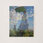 Monet The Promenade Woman with a Parasol Puzzle<br><div class="desc">Claude Monet The Promenade Woman with a Parasol puzzle. Oil painting on canvas from 1875. One of Monet’s most charming early works, The Promenade features a young woman and child standing in a field above yellow wildflowers. The woman holds a green and blue parasol as the wind pulls her veil...</div>