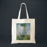 Monet Tote Bag Art, Woman with a Parasol<br><div class="desc">Woman in a Parasol Tote Bag
Painting by Claude Monet (1875)
This Tote Bag shows off the hidden features and history behind this gorgeous piece of art. 
Practical and suitable for daily use,  perfect for art enthusiasts.
This product is made with 1OO% COTTON.</div>