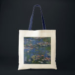 MONET Water Lilies 1916 Tote  Bag navy handles<br><div class="desc">French Impressionist painter, Claude Monet painted this Water Lilies --- 1916, originally as an oil on canvas painting from the inspirations of his own backyard in early 20th Century France. Being 76 years of age when he painted this water lily pond creation, Monet's cataracts were progressing and changing his perception...</div>