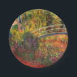 Monet Water Lily Pond and Water Irises Paper Plate<br><div class="desc">Paper Plates featuring Claude Monet’s oil painting of a Japanese bridge and beautiful flowers. Water lily pond and water irises bathed in pink light. Serene nature impressionism with lovely flowers and scenic pond landscape. A great Monet gift for fans of impressionism and French art.</div>