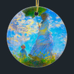 Monet Woman with a Parasol Ceramic Ornament<br><div class="desc">An ornament featuring Claude Monet’s wife,  Camille,  holding a parasol,  and their son,  Jean,  taking a walk in a vibrant green field being blown by the wind on a summer’s day. A great Monet gift for fans of impressionism and French art.</div>