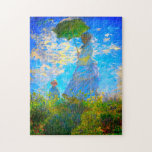 Monet Woman with a Parasol Jigsaw Puzzle<br><div class="desc">Jigsaw Puzzle featuring Claude Monet’s wife,  Camille,  holding a parasol,  and their son,  Jean,  taking a walk in a vibrant green field being blown by the wind on a summer’s day. A great Monet gift for fans of impressionism and French art.</div>