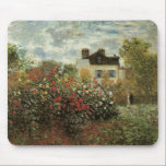 Monet's Garden at Argenteuil by Claude Monet Mouse Pad<br><div class="desc">The Artist's Garden in Argenteuil (A Corner of the Garden with Dahlias) (1873) by Claude Monet is a vintage impressionism fine art floral nature painting. A country farm house is in the background. A couple in love is walking past a romantic spring season garden with blooming roses and other flowers....</div>