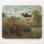Monet's Garden at Argenteuil by Claude Monet Mouse Pad<br><div class="desc">The Artist's Garden in Argenteuil (A Corner of the Garden with Dahlias) (1873) by Claude Monet is a vintage impressionism fine art floral nature painting. A country farm house is in the background. A couple in love is walking past a romantic spring season garden with blooming roses and other flowers....</div>