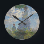 Monet's Woman with a parasol Round Clock<br><div class="desc">Claude Monet's masterpiece: Woman with a parasol.
Please visit our store for othe rmatchin items</div>
