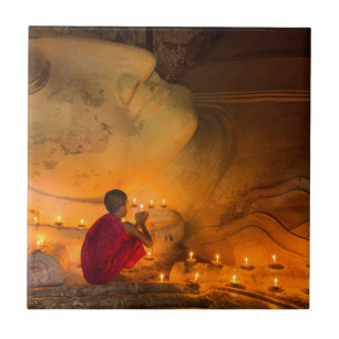 Monk Praying By A Buddha Ceramic Tile