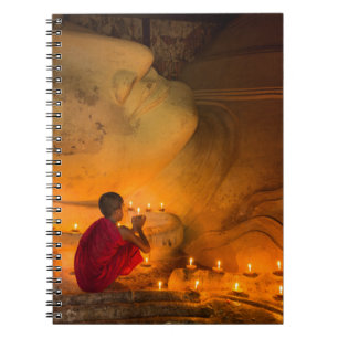 Monk Praying By A Buddha Notebook