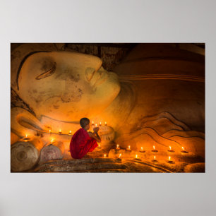 Monk Praying By A Buddha Poster