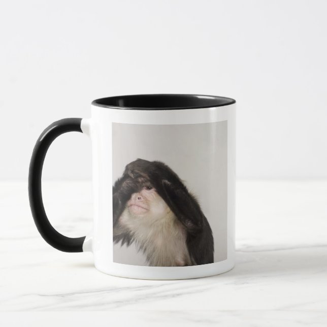 Monkey covering its eyes mug (Left)
