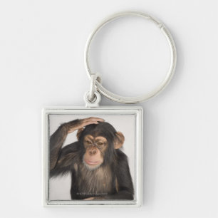 Monkey scratching its head key ring