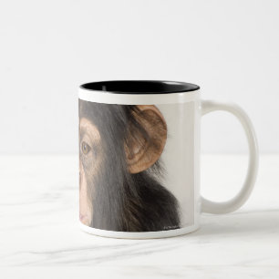 Monkey scratching its head Two-Tone coffee mug