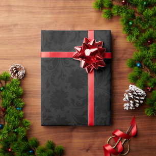 Monochromatic black floral damask pattern on grey wrapping paper