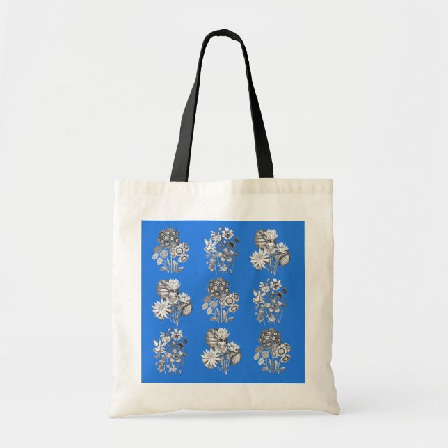 Monochrome flowers on electric blue background tote bag
