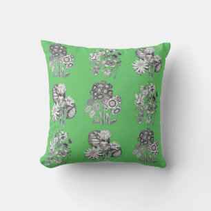Monochrome flowers on green background cushion