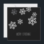 Monochrome Minimalist Snowflake Christmas Pattern Holiday Card<br><div class="desc">This black and white, simple snowflake pattern encapsulates the serene beauty of winter with a modern, minimalist flair. Crafted in a sophisticated black and white colour scheme, this design is the epitome of understated elegance, perfect for those who appreciate a masculine touch in their holiday decor. Each snowflake creates a...</div>