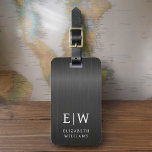 Monogram Black Brushed Metallic Elegant Luggage Tag<br><div class="desc">Elevate your travel experience with our Classic Elegant Modern Minimalist Monogram Luggage Tag. This meticulously designed accessory seamlessly combines timeless elegance with contemporary minimalism, ensuring your luggage stands out with sophistication. Crafted with precision and attention to detail, this luggage tag is more than just a practical item; it's a personalised...</div>