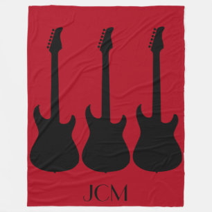 Monogram Black Electric Guitars on Dark Red Fleece Blanket