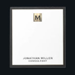 Monogram Black Gold Initial Notepad<br><div class="desc">Elevate your stationery game with this monogrammed notepad featuring classic block typography and a black leather print frame with a brushed gold medallion monogram. The notepad includes space for custom text, such as your name and title, making it perfect for personal or professional use. Use it to jot down notes,...</div>