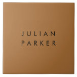 Monogram black minimalist brown ceramic tile<br><div class="desc">A sleek and timeless monogram takes centre stage against a rich brown background,  capturing minimalist elegance in its purest form. The juxtaposition of black initials on the warm backdrop creates a balanced and distinguished design,  ideal for adding a touch of personal refinement to any setting.</div>