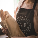 Monogram Black Personalised Apron<br><div class="desc">Cook in style with this Monogram Black Personalised Apron. Featuring a sleek black design and a customisable monogram, this apron adds a touch of sophistication to any kitchen. Made from durable and high-quality materials, it provides both comfort and protection, making it perfect for both amateur and professional chefs. Whether you're...</div>