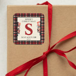 Monogram Christmas Nutcracker Gift Square Sticker<br><div class="desc">Add a personal touch to your gift-giving this Christmas. Discover our unique monogram stickers, adorned with a festive plaid background and a cute nutcracker soldiers peeking out. Personalise thestickers with your child's initial, name, a special Christmas greeting, and the year. It's not just about the gift, but how you present...</div>