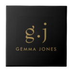 Monogram Classic Elegant Minimal Gold Black Ceramic Tile<br><div class="desc">A modern minimalist gold monogram on black ceramic tile, featuring a simple clean modern minimalist monogram with simple lower case serif typography initials. A punctuation mark (period) divides the first and last initial as a simple design element that defines this typography style as modern and clean. Your name in uppercase...</div>